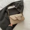 Bolsa de Ombro Feminina Tendência 2025 Nova Versão Coreana Simples Versátil Pequena Quadrada Bolsa de Ombro Texturizada