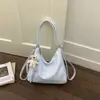Bolsas Retrô Transfronteiriças, Bolsas Tote Coreanas de Nicho para Mulheres, Novos Modelos Transfronteiriços, Bolsas de Ombro Simples Casuais de Grande Capacidade para o Dia a Dia