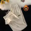 Colección Otoño/Invierno 2026 Transfronteriza: Pantalones deportivos largos de peso pesado con forro de polar para hombre, pantalones casuales de pana, corte holgado, estilo de pierna recta