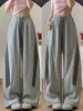 Pantalones deportivos anchos de estilo americano con tres rayas para mujer, nuevo modelo otoño 2026, de cintura alta, corte holgado, adelgazantes, pantalones de baile de moda