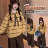 Conjunto de Suéter Rayado de Otoño para Niñas 2026 Nuevo Estilo Coreano Conjunto de Dos Piezas de Top de Punto y Pantalones de Pierna Ancha para Niña Grande