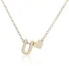 Exquisita cadena de suéter simple europea y americana con colgante de letra en forma de corazón de durazno, collar para clavícula de mujer, joyería de fábrica al por mayor