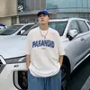 Venta Directa de Fábrica de Camiseta de Algodón de Verano para Hombre con Mangas de Tres Cuartos, Estilo Hong Kong, Cuello Redondo, Mangas Cortas, Corte Holgado, Top de Manga Media con Estampado de Letras