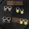Pendientes de Cristal Redondos con Lunares Electrochapados 2026 Verano Tendencia Estilo Celebridad de Internet Personalidad Moda para Mujer con un Toque de Lujo Ligero y Alta Gama