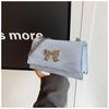 Bolso de moda de estilo coreano para mujer, nuevo bolso de viaje sencillo de color sólido con diseño de mariposa, pequeño bolso cuadrado, elegante bolso cruzado con cadena, 2024