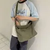 Bolsa de lona de gran capacidad para mujer, nuevo modelo 2026, bolso tote moderno y versátil para viajes, adecuado para estudiantes que van a clase y para el trabajo, bolso cruzado