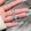 Exquisito Collar de Mariposa con Piedra Ojo de Gato para Mujer, Cadena para Clavícula Versátil con Colgante Hueco de Zirconia de Lujo Ligero de Nicho