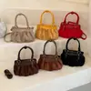 Bolso nube de gamuza con lazo estilo coreano de nicho para mujer, nuevo bolso de hombro y cruzado de moda 2026 para commuting