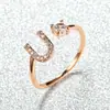 Anillo con Letra de Oro Rosa Nuevo de Amazon Transfronterizo Anillo Abierto con Diamante Blanco Joyería de Mano Anillo Único Personalizado Venta al por Mayor