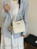 Bolsa de Mão Retrô Transfronteiriça para Mulheres Moda Primavera 2026 Bolsa Saco Design de Nicho Bolsa Transversal para Mulheres Conjunto