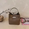 Bolsa tote casual estilo coreano transfronteiriça, bolsa Kelly para mulheres, nova coleção primavera/verão 2026, bolsa de ombro de alta qualidade para exportação