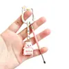 Cortauñas de dibujos animados de gato y cachorro lindo con limpiador de oídos, colgante para bolso, pequeño set de regalo