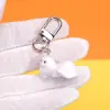 Colgante Hebilla Colgante Gato Lindo Tridimensional Anillo Cadena Llavero Gato Acostado Colgante Ropa Teléfono Móvil Venta al por Mayor Transfronteriza