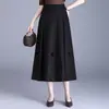 Falda midi de cintura alta con flores tridimensionales para mujer, nuevo estilo otoño 2026, elegante y con caída, falda de línea A tipo paraguas