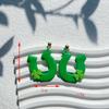 Calle popular transfronteriza. Pendientes verdes del Día de San Patricio, diseño de nicho, pendientes de temperamento de mujer de alta calidad, venta al por mayor
