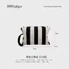 Bolsa de punto a rayas más vendida transfronteriza, simple y elegante, bolsa de cosméticos de alto valor, bolsa de almacenamiento portátil de gran capacidad