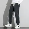 Pantalones deportivos transfronterizos finos, de corte holgado y hasta el tobillo para hombre, adecuados para primavera, otoño e invierno; pantalones largos casuales de pana para hombre
