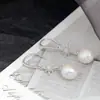 Pabellón Nafu Joyería de Plata al por Mayor Pendientes con Perla Barroca Natural Incrustada de Plata de Ley 925 Pendientes de Moda Elegantes Chapados en Oro