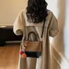 Bolso Versátil de Moda para Mujer 2025 Nuevo de Moda Retro Bloque de Color Gamuza Bolso de Hombro Bolso de Mano de Alta Gama Bolso Cruzado