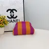 Bolso de mano simple de punto a rayas, bolsa tejida versátil de gran capacidad más vendida, bolso nube de alta gama