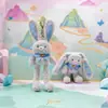 Jinnew Original Nuevo Estilo Chino Divertido Colgante de Peluche de Conejo Desplegable Llavero de Conejo de Orejas Tirables Muñeca Venta al por Mayor