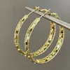 Pendientes de Aro Ancho de Metal Estilo Minimalista Dulce-Cool Europeo y Americano, Pendientes de Nicho de Lujo Ligero Que Realzan la Elegancia, Accesorios Atmosféricos