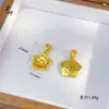 Pingente de Flor de Camélia com Design Vazado Esculpido, Cravejado com Diamantes, Cobre Galvanizado, Filigrana de Saco de Dinheiro Banhado a Ouro, Corrente de Suéter Tendência Nacional