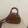 Bolso de Hombro Cruzado de Alta Apariencia Estilo Coreano Verano 2026 Nueva Moda Diseño de Nicho Simple Versátil Elegante