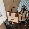 Bolsa de palha artesanal super popular de nicho transfronteiriça para mulheres, nova bolsa de ombro tipo balde versátil 2026, bolsa pequena transpassada tecida
