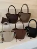 Bolsa tote tipo cubo elegante de gran capacidad transfronteriza, nueva colección otoño 2026, bolso de hombro/bolso cruzado casual y versátil, juego de dos bolsas