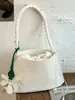 Bolso de mano casual de gran capacidad con patrón tejido vintage, elegante 2026 nueva bolsa de verano casual de lujo ligero para mujer bajo el brazo