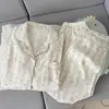 Promoción de transmisión en vivo de primavera: pijama nuevo para mujer, con un cárdigan de doble capa y cuello estiloso, estampado creativo y sencillo de nubes, y suave tejido de algodón de manga larga