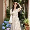 Vestido Largo Floral de Cuello en V Estilo Nuevo 2026 con un Ambiente Versátil, Puede Ser Tanto Elegante como Dulce, Longitud Media, Moda Elegante para Mujer, Fresco y Sencillo