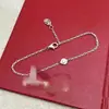 Versión alta tarjeta de collar OVNI familia un diamante femenino V chapado en oro oro de 18 quilates diamante único pequeño colgante redondo collar cadena de clavícula dropshipping