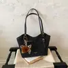 Bolsa Feminina Grande Capacidade Elegante para o Dia a Dia 2026 Outono Inicial Nova Bolsa de Ombro Único Bolsa Tote de Mão Tendência de Alto Estilo