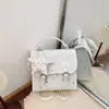 Bolsa de Ombro Dupla Estrela de Verão Feminina 2026 Nova Tendência Moda Versátil Bolsa de Mão Mochila Mini para Estudante Viagem Bolsa Quadrada