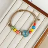 Pulsera de Cerámica Tejida con Diseño de Nicho, Sensación de Alta Gama, Dulce y Versátil para Mujeres, Pulsera Artística de Concha Marina, Joyería de Costa