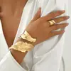Conjunto de pulseira e anel em ouro com design europeu e americano transfronteiriço, moderno e único, design aberto exagerado, conjunto de duas peças de joias de luxo leve