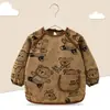 Babero de terciopelo de cristal para bebé, impermeable, antidesgaste, con bolsillo de arroz, para otoño e invierno, delantal para madre y bebé.