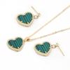 CDD nuevo amor trébol de cuatro hojas cobre dos piezas para mujer comercio electrónico transfronterizo explosiones arete de collar corazón de durazno suministro comercio exterior