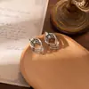Pendientes Metálicos Galvanizados de Nuevo Estilo Europeo y Americano, Pendientes de Lujo Ligero de Nicho de Gama Alta, Pendientes Geométricos de Doble Círculo Personalizados de Venta Caliente