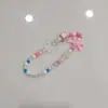 Cadena para teléfono móvil con cuentas de niña linda, cordón, flor acrílica, lazo, corazón con cuentas, funda de teléfono, adornos de cuentas de colores