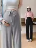 Pantalones de maternidad de pierna ancha para primavera y otoño, pantalones de soporte para el vientre acanalados fluidos, pantalones de maternidad de pierna recta holgados y adelgazantes a la moda, de longitud completa.