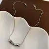 Titânio aço não-desbotamento oco colar de amor luz de luxo nicho design pingente de amor temperamento versátil cadeia de clavícula