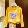 Camiseta básica para meninas para primavera e outono 2026 novo modelo, top infantil de algodão puro fofo estiloso, camiseta infantil de manga longa