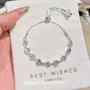 Pulseira Francesa Laço Delicado Coração de Pérola Luxo Leve Temperamento Empilhável Fashionável Versátil Pulseira Laço Coração