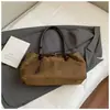 Bolsa Casual Retro de Grande Capacidade 2025 Nova Versátil para o Dia a Dia Feminina Bolsa de Ombro Bolsa Tote de Mão em Camurça