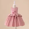 Atacado de roupas infantis Europa e Estados Unidos novo verão meninas explosões suspensórios amarelo saia princesa malha saia pompom uma geração de cabelo