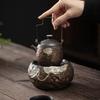 Estufa de té caliente estilo japonés de hierro dorado esmaltado tipo loto, mesa de té de gres con base aislante para calentar velas, juego de té de kung fu