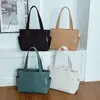 Bolso de Mano para Mujer Estilo Coreano Patrón Simple de Rombo 2026 Otoño e Invierno Nueva Moda Color Sólido Versátil de Hombro de Moda
